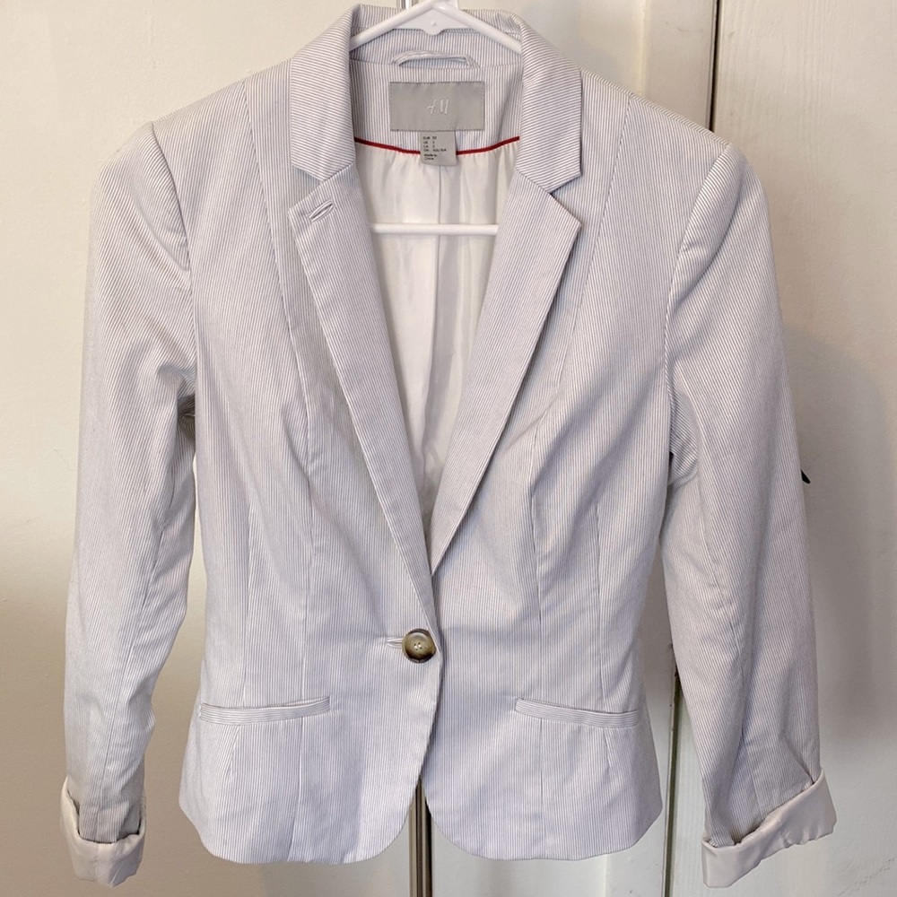 Blue and white striped blazer.